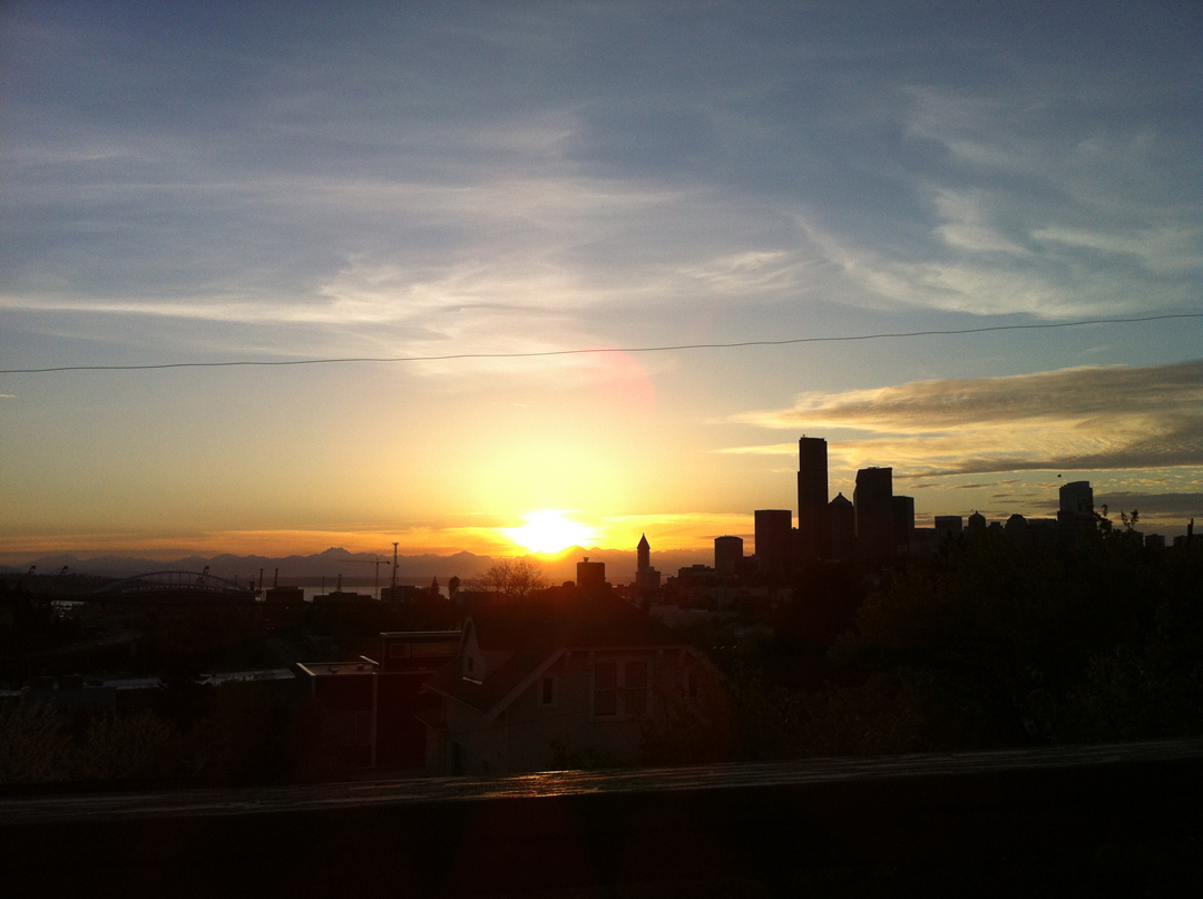 Sunset over the Cascades and Seattle skyline